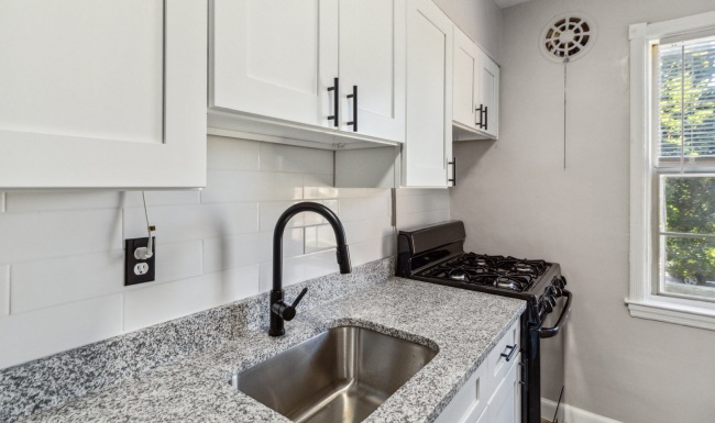 Well-lit kitchen with ample counter space